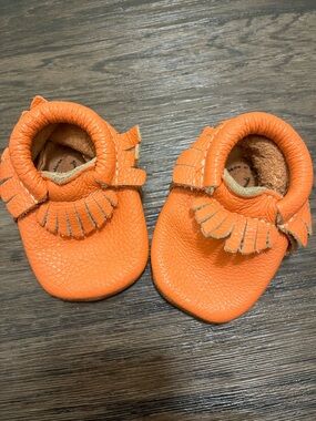 Freshly Picked electric coral Fringe Moccasins - Baby Shoes